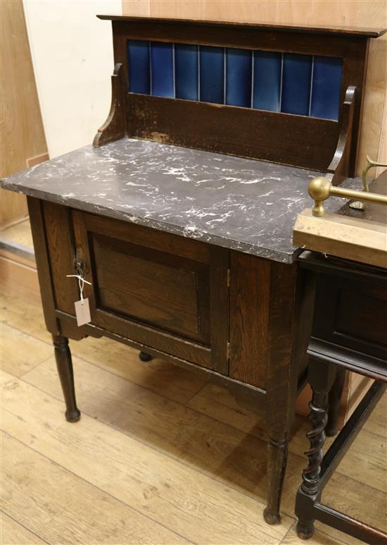 A late Victorian oak, marble topped washstand W.76cm